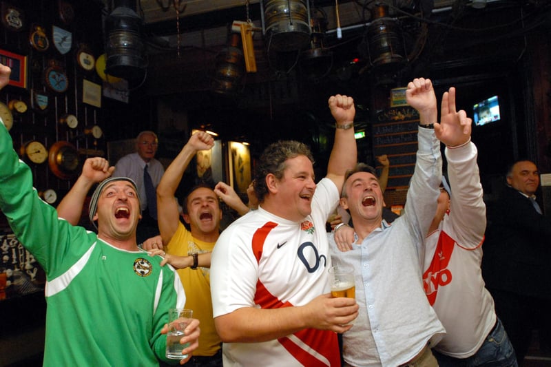 Celebrations at an England goal for these fans at the Steamboat.