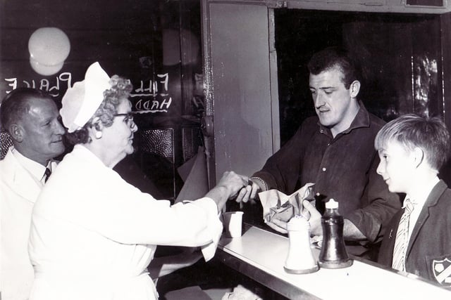 Mrs Edith Allen serving fish and chips in Walter Dixon's fish and chip shop, London Road, Sheffield, September 1963