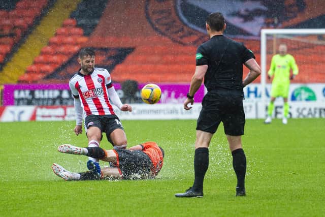Oliver Norwood in action against Dundee United in sheffield United's pre-season friednly at Tannadice