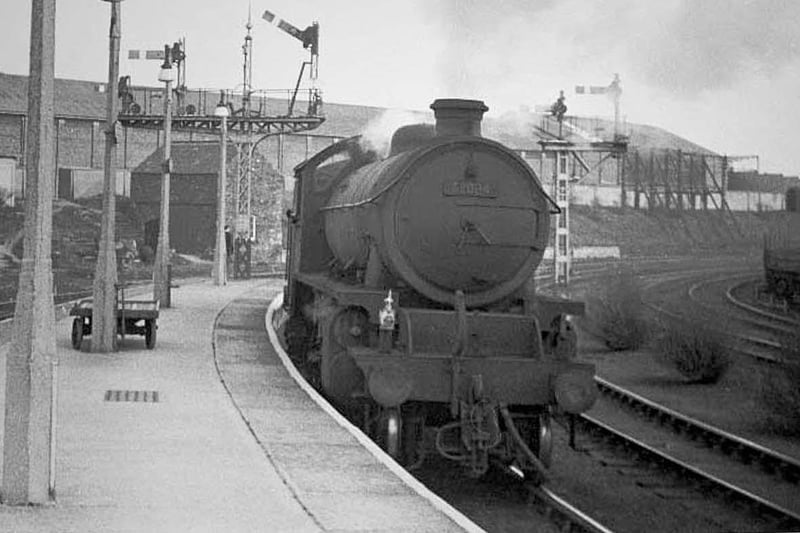 A steam engine is pictured heading north through West Hartlepool railway station in April 1966.
