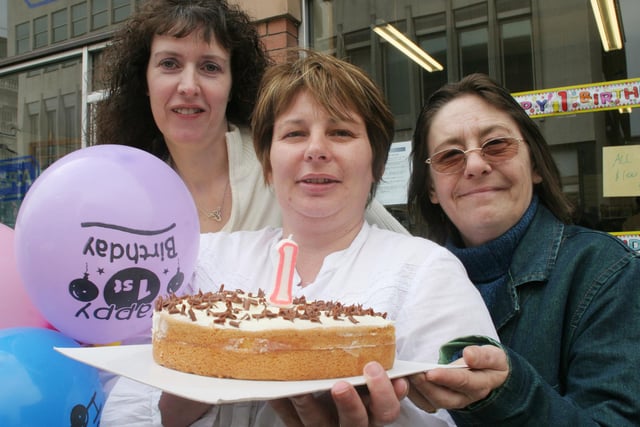 RSPCA volunteers  Sharon Hill, Julia Norbury, Karen Gregory, celebrate the first birthday of the charity shop.
