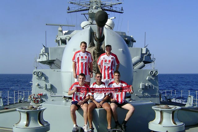 Blades fans on board HMS St Albans: Back row; Jonathan Mills, Kevin Wilson. Front row; Paul Willcocks, Ian Wood, Daniel Crossland.