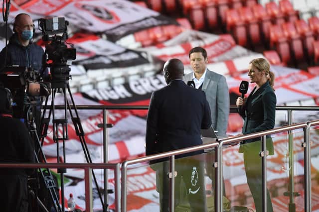 Television presenter Gabby Logan, working for Amazon Prime TV, on-air with United legend Michael Brown following the Blades' clash with Everton last season (Photo by MICHAEL REGAN/POOL/AFP via Getty Images)