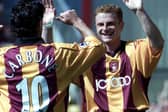 Wayne Jacobs, pictured here celebrating with fellow former Sheffield Wednesday man Benito Carbone, has remained a presence with the Owls in recent weeks.