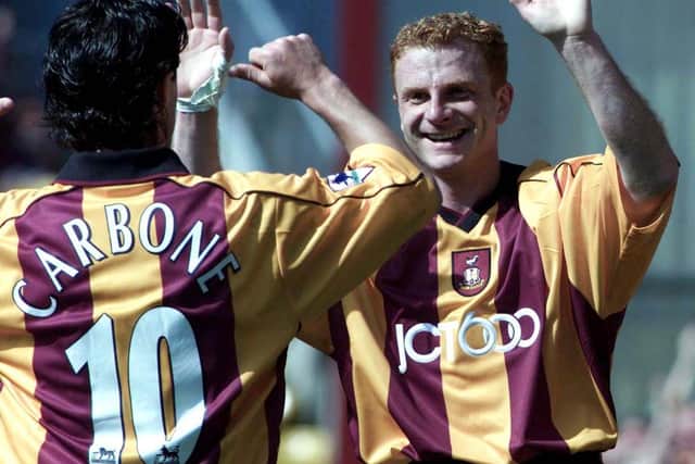 Wayne Jacobs, pictured here celebrating with fellow former Sheffield Wednesday man Benito Carbone, has remained a presence with the Owls in recent weeks.