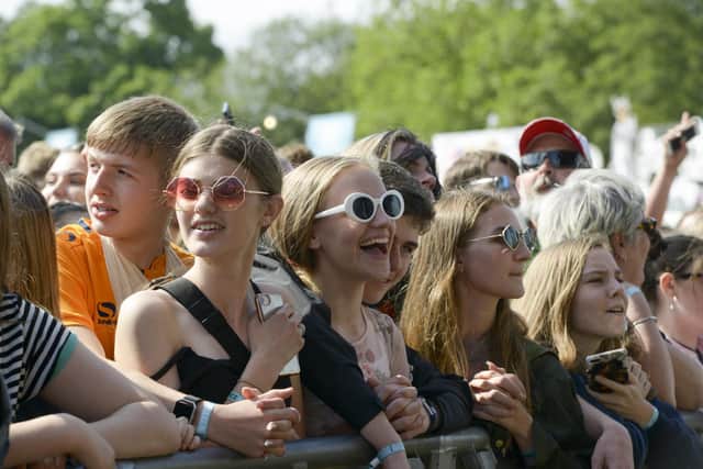 Crowds enjoy watching Miles Kane on the mainstage in Hillsborough Park during Tramlines 2019