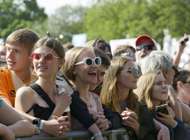 Crowds enjoy watching Miles Kane on the mainstage in Hillsborough Park during Tramlines 2019