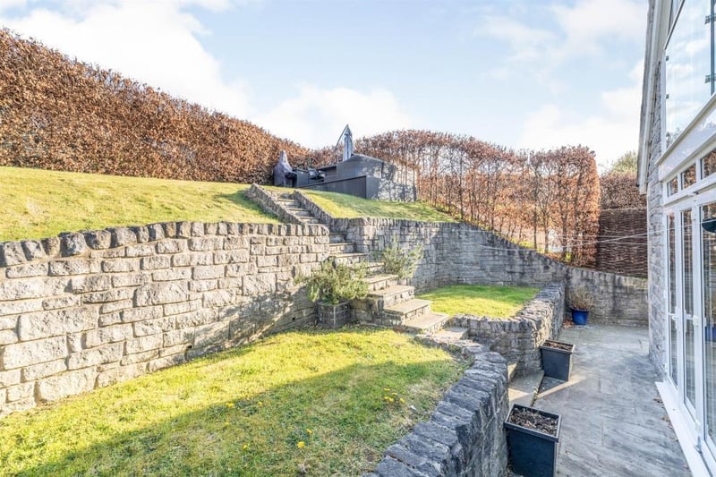 At the rear of the property, steps lead up to a lawn with a decking area which is perfect for al-fresco dining. From this elevated position at the rear of the property, there are truly stunning panoramic views over the Bakewell and the surrounding countryside.