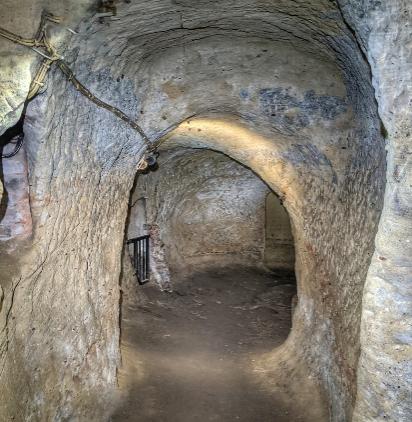 Take an exciting trip through a network of caves that have been carved out of sandstone at the City of Caves.