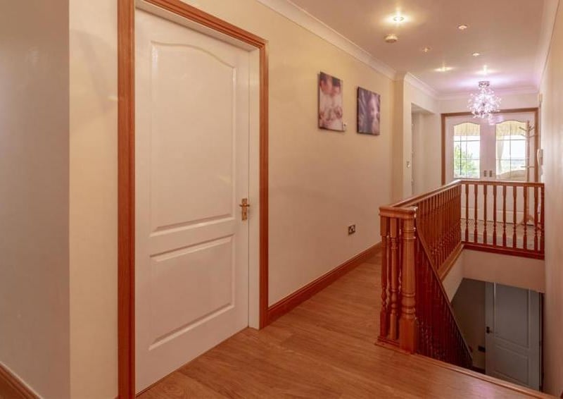 The stairs and landing at the five-bedroom property. All leading to more rooms to investigate.