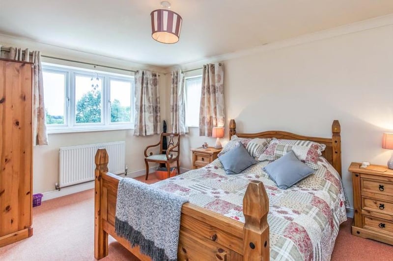 The master bedroom is bright and oozing comfort, with double-glazed windows, a central heating radiator and coving to the ceiling. Its en-suite is fitted with a shower, wash hand basin and low-level WC.