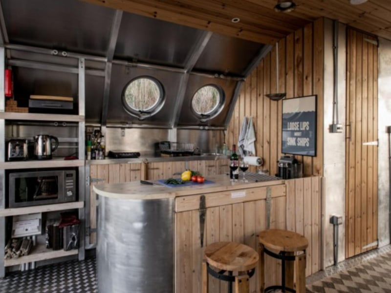 The well-equipped kitchenette has everything you need to make a tasty meal for two.