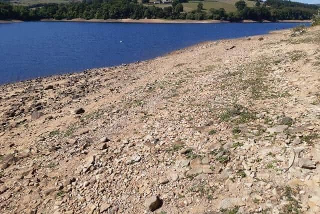 These images from Howden Reservoir, near Snake Pass, were taken after figures on August 8 reveal the water levels were down to just 14.6 per cent.