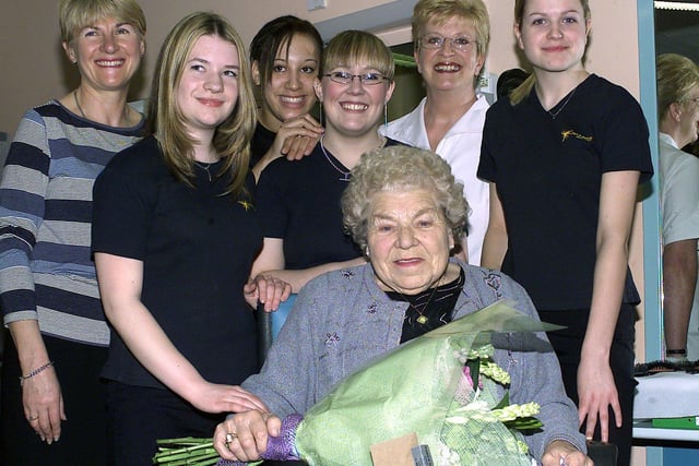 Lena Lowdell has been having her hair cut at Castle College since it opened 30 years ago. To help celebrate her 90th birthday in 2004 the staff and students presented her with flowers