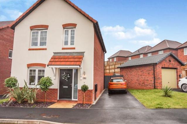Offers in excess of £220,000 are being invited for this three-bedroom detached house.