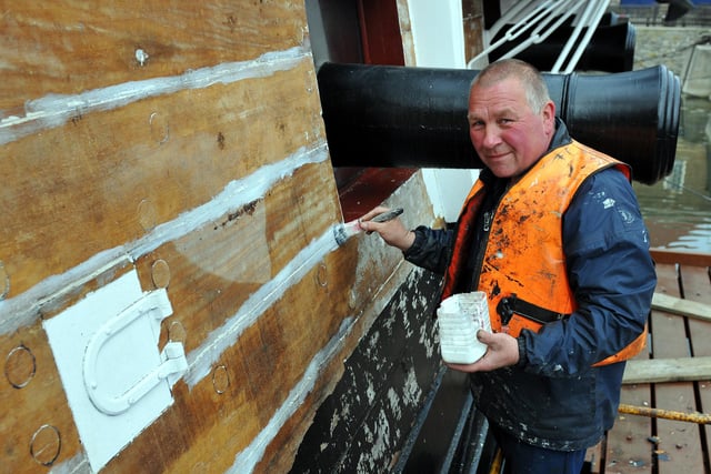 David Lilley carries out resealing work to part of HMS Trincomalee in 2011. Picture By FRANK REID