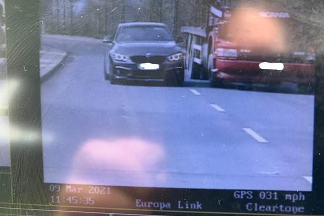 An unlicensed and uninsured driver was caught after he was seen overtaking on the road outside the police base used by traffic cops in Sheffield