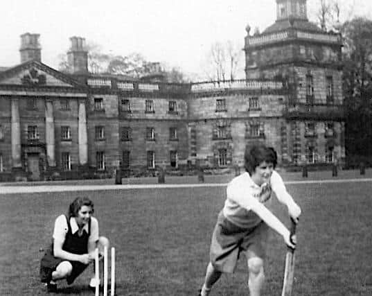 Lady Mabel students playing cricket in front of the North Tower
