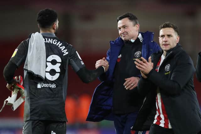 Paul Heckingbottom, manager of Sheffield United, and goalkeeper Wes Foderingham: Isaac Parkin / Sportimage