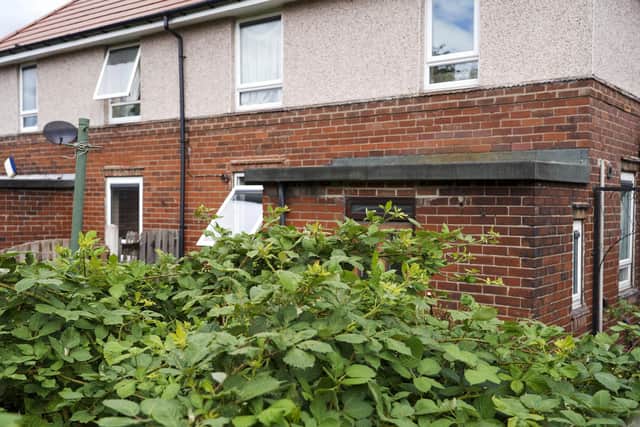 The overgrown garden at a council house on Buchanan Road in Parson Cross, Sheffield, which has been empty for a year. Picture Scott Merrylees