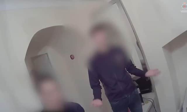 Screen grab from handout bodycam footage issued by Lancashire Police of the scene as police interrupted a birthday party attended by about 30 students.