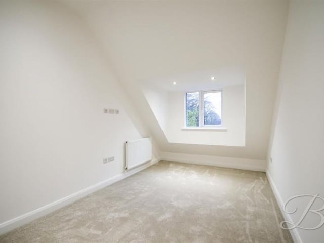 This bedroom is 8'8" by 11'11".