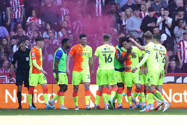 Nottingham Forest's Brennan Johnson (third right) celebrates scoring their side's second goal of the game with team-mates during the Sky Bet Championship play-off semi-final, first leg match at Bramall Lane
