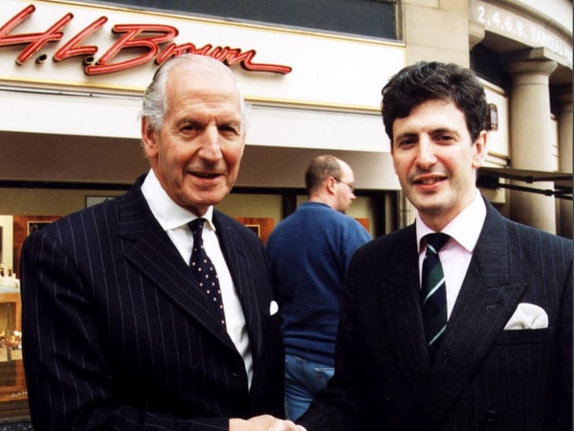 Michael Frampton relinquishes the reins to his son Jimmy at H. L. Brown Jewellers, Barker's Pool, Sheffield, on October 29. 2001