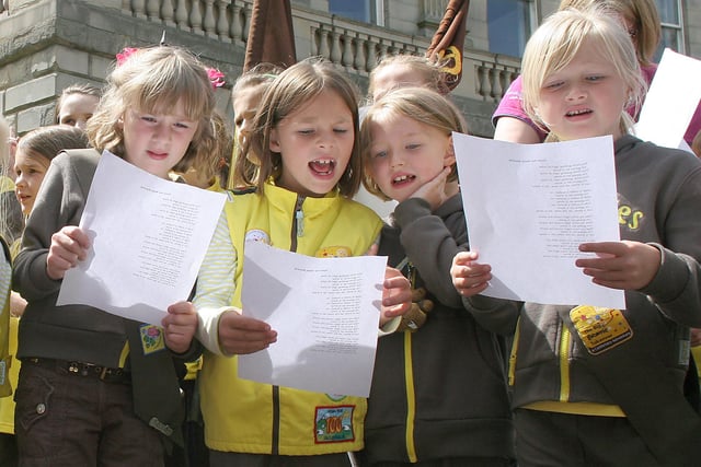 Some of the hundreds of Brownies and Guides who took part in the blessing of St Annes Well in 2010