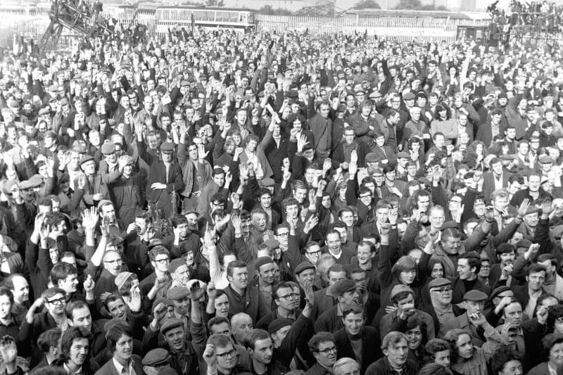 Upper Clyde Shipbuilders demonstrate their support of the UCS shop stewards with a show of hands at a mass meeting in Govan shipyards in September 1971.