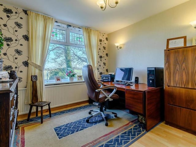 Next up is the study, which can be found next to the dining room. A stylish room, with a laminate floor,  radiator and two wall-light points, it also offers wonderful views. Just the job if you're working from home.