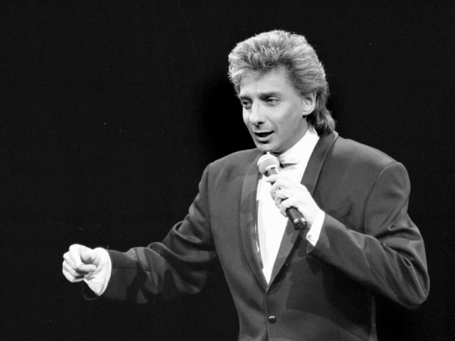 American singer/songwriter Barry Manilow in concert at the Playhouse theatre in Edinburgh, February 1990.