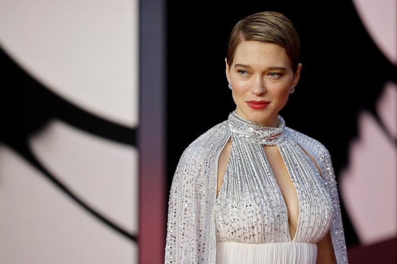 French actor Lea Seydoux poses on the red carpet after arriving to attend the World Premiere of the James Bond 007 film "No Time to Die" at the Royal Albert Hall in west London.