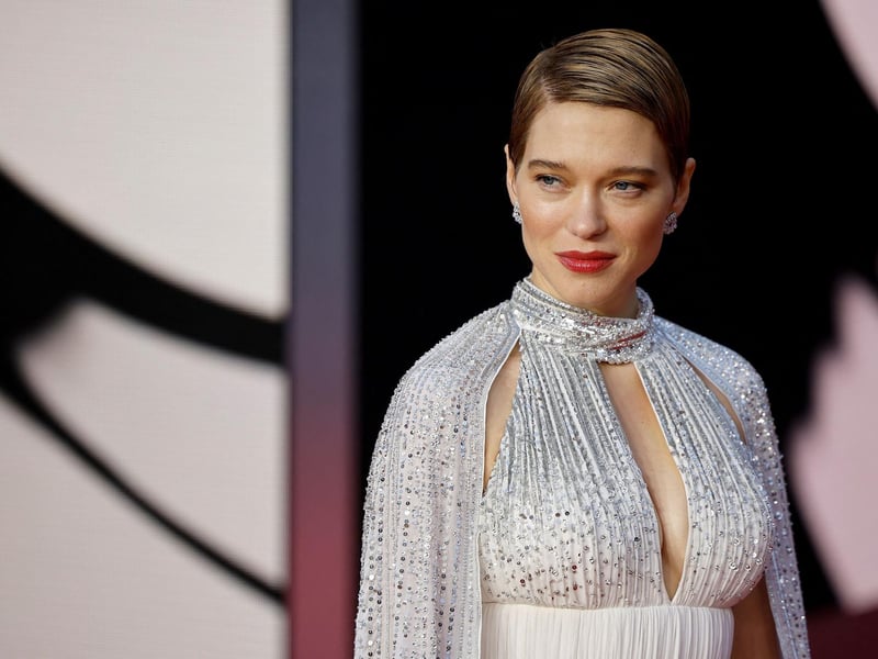 French actor Lea Seydoux poses on the red carpet after arriving to attend the World Premiere of the James Bond 007 film "No Time to Die" at the Royal Albert Hall in west London.