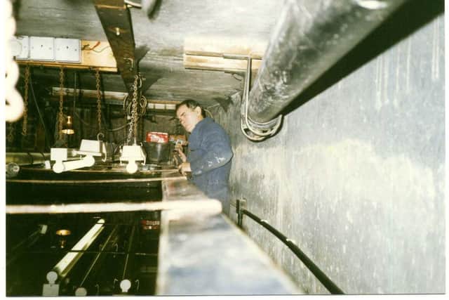 Ken Cornthwaite looked after the fish in the tank at Sheffield's famous Hole in the Road subway for 11 years until the underpass was filled in in 1994. He travelled from his home in Highfield to feed them five times a week, and received only expenses for his service. Photo: Kath Hammond
