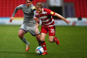Sheffield Wednesday target Josh Sims played under Darren Moore at Doncaster Rovers.