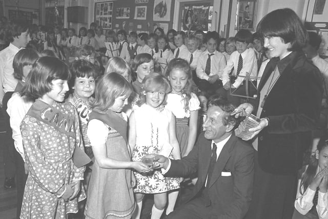 The presentation of Jubilee coins at Grangetown Junior School in 1977. Does this bring back happy memories?
