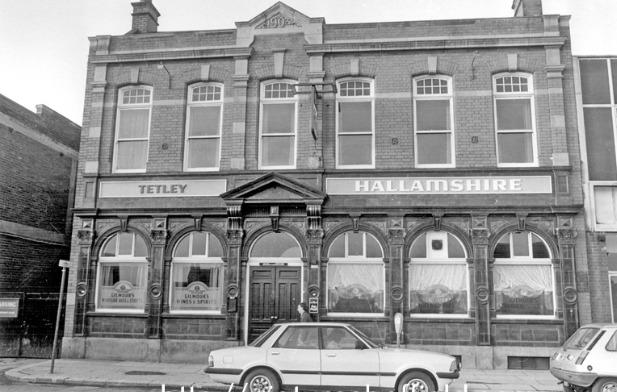 Pictured in the 1980s, the Hallamshire, on West Street, was at the time a popular music venue, which hosted up and coming bands such as Pulp in the 80s and 90s, who played gigs in a room upstairs. Unusual haircuts were the norm in the bar. Picture Sheffield / Sheffield Newspapers