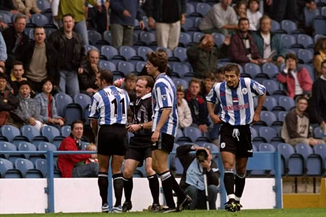 Sheffield Wednesday's Paolo Di Canio pushed referee Paul Alcock during the home game with Arsenal at Hillsborough in September 1998. Photo: Mark Thompson /Allsport.