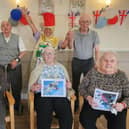 Activities coordinator Rachael Addy (back, centre) and residents at Deangate Care Home, in Barnsley.