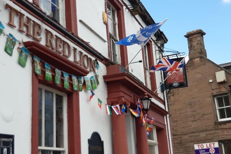 Flags and bunting at The Red Lion.