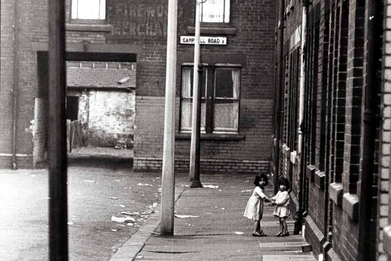 Two little girls playing on Carltonville Road, Attercliffe, May 19, 1971
