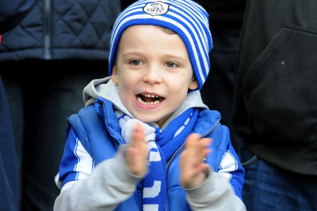 A young Wednesday fan cheers on his team during the third round tie with West Ham United at Hillsborough in January 2012.