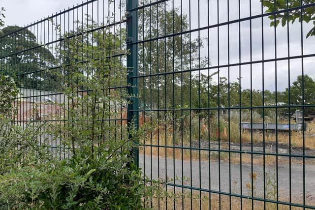 The Norton Nurseries site in Graves Park, Sheffield, seen through a fence from Chantreyland wildlife meadow. Picture: Julia Armstrong, LDRS