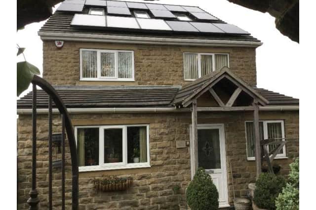 This eco friendly property has solar panels and a unique wood burning boiler unit which provides heating to all underfloor heating along with the radiators. The brochure says: "This energy saving property really has it all."