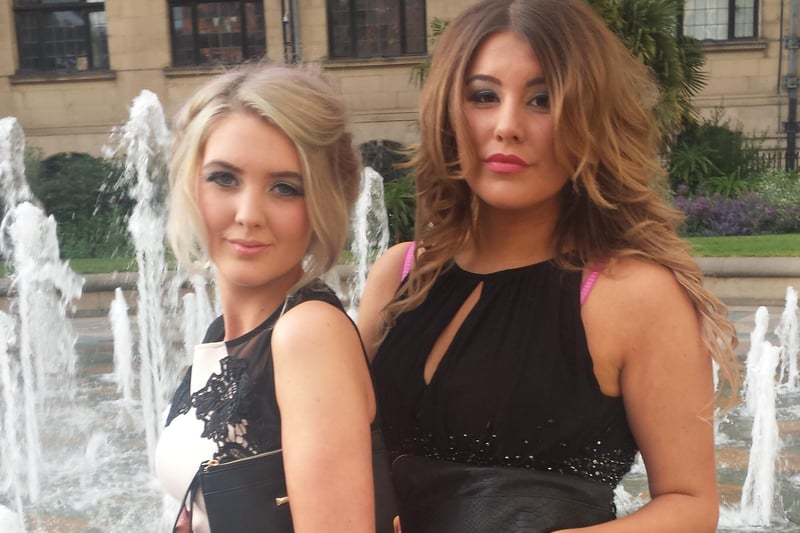 Elle Whitham, left, and Amelia Broughton pose for a pcitre in the Peace Gardens before heading to Eckington school prom at the Mercure Hotel, Sheffield