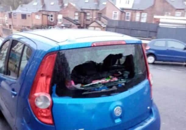Damage to a car in Burngreave, Sheffield, after a brick placed on top of a bin was sent flying in the strong winds
