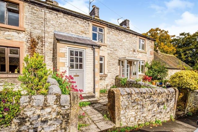 This two-bedroom cottage has an asking price of £250,000. (https://www.zoopla.co.uk/for-sale/details/56571931)