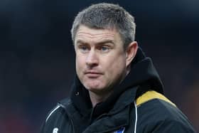 Cheltenham Town director of football Micky Moore could be on the move.