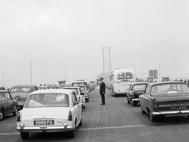 Cars and buses tailback at the Forth Road Bridge tollbooths in 1964 - shortly after the bridge opened.